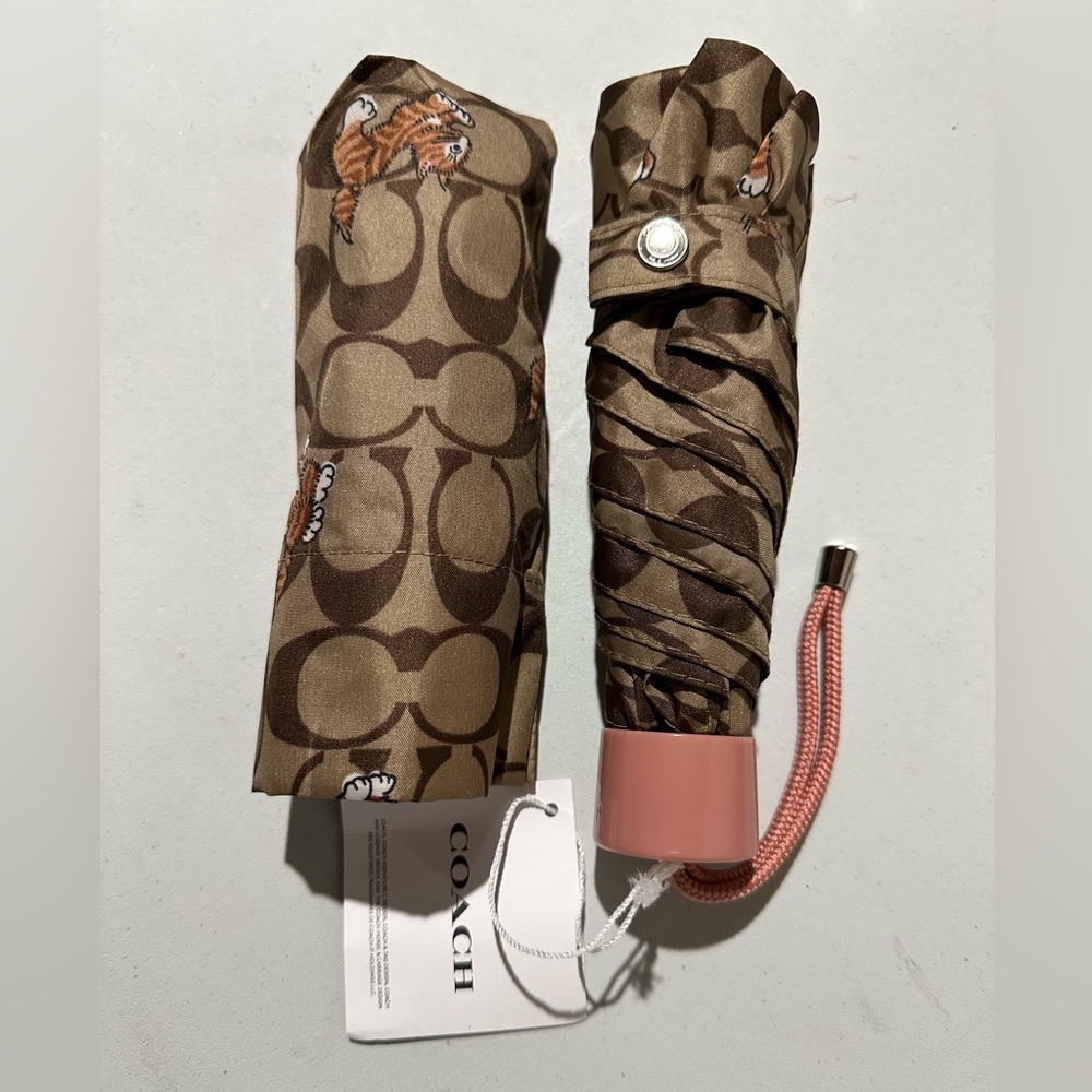 - Coach tri fold umbrella nwt 6.5 inches